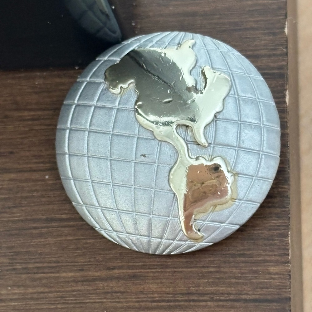 North and South America brooch/ silver color